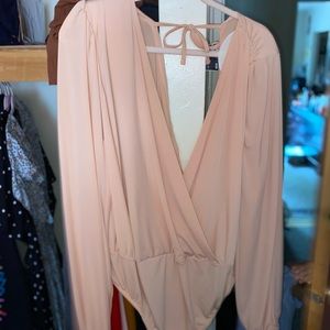 Blush pink bodysuit, never been worn! Open on front and back